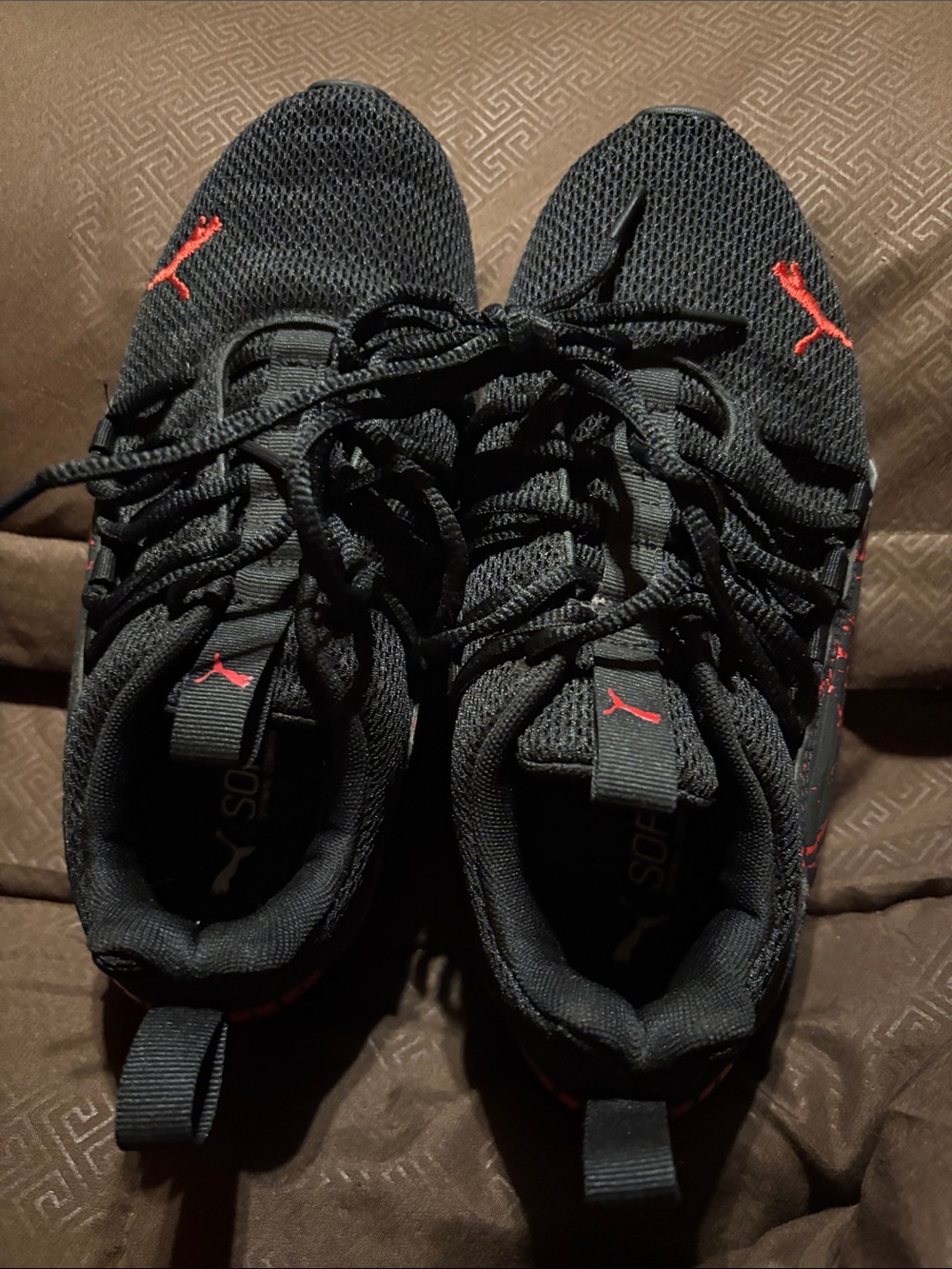Puma Black Sneakers with Red Accents